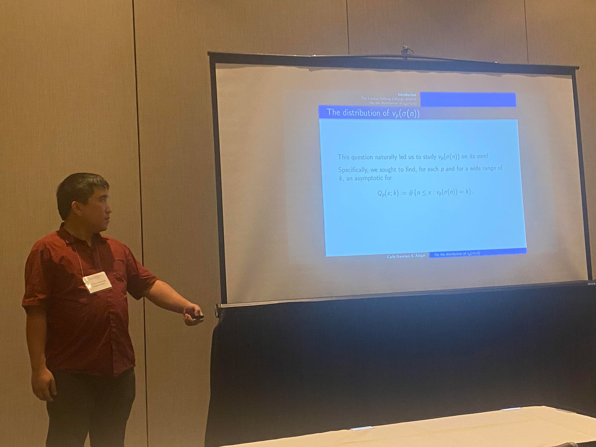 A picture of me at the AMS Spring Eastern Sectional Meeting, presenting some research.